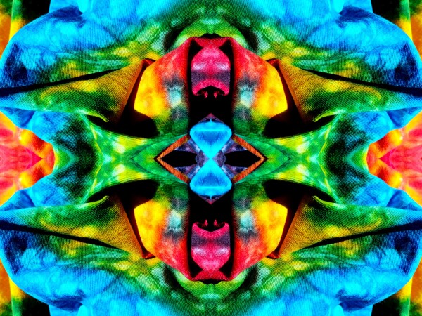 Carefree 2 - a stunning 16" x 12" Acrylic Print of Mirrored Colorful Tie-Dyed cloth.