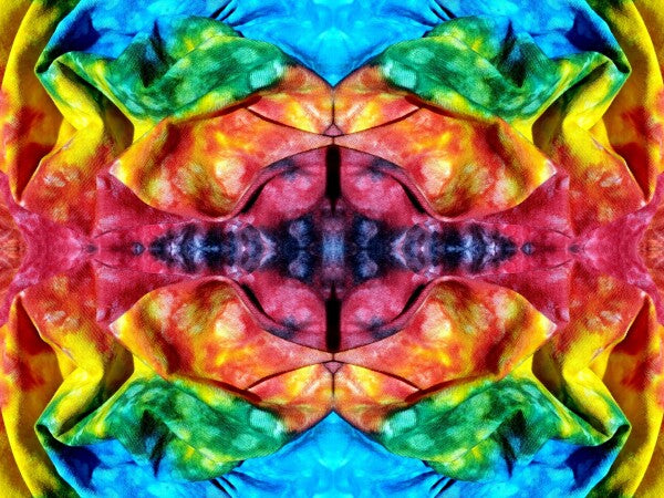 Whimsey 3 - a stunning 16" x 12" Acrylic Print of Mirrored Colorful Tie-Dyed cloth.