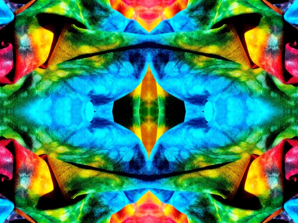 Carefree 3 - a stunning 16" x 12" Acrylic Print of Mirrored Colorful Tie-Dyed cloth.
